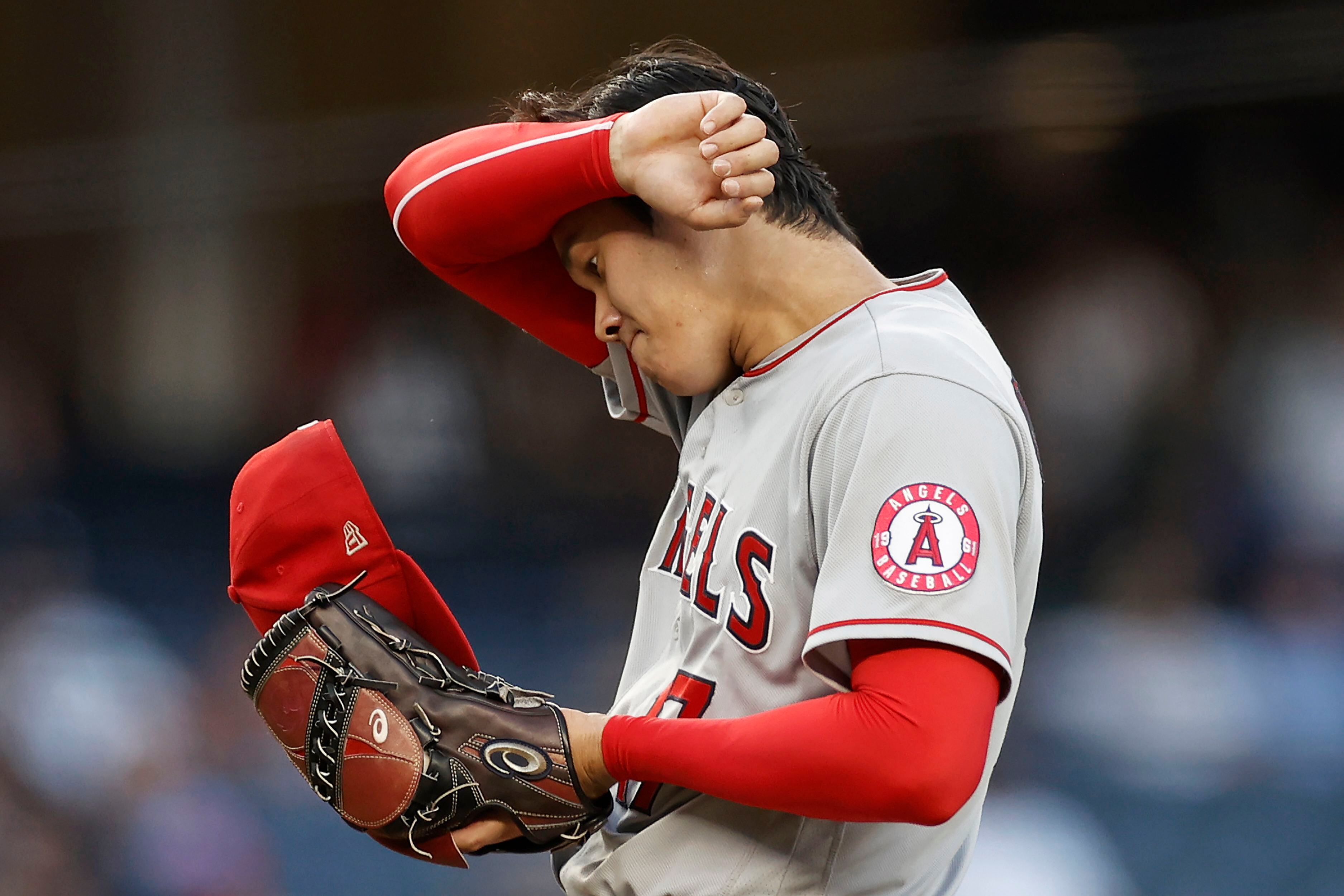 Home run leader Ohtani flops on mound, Local Sports