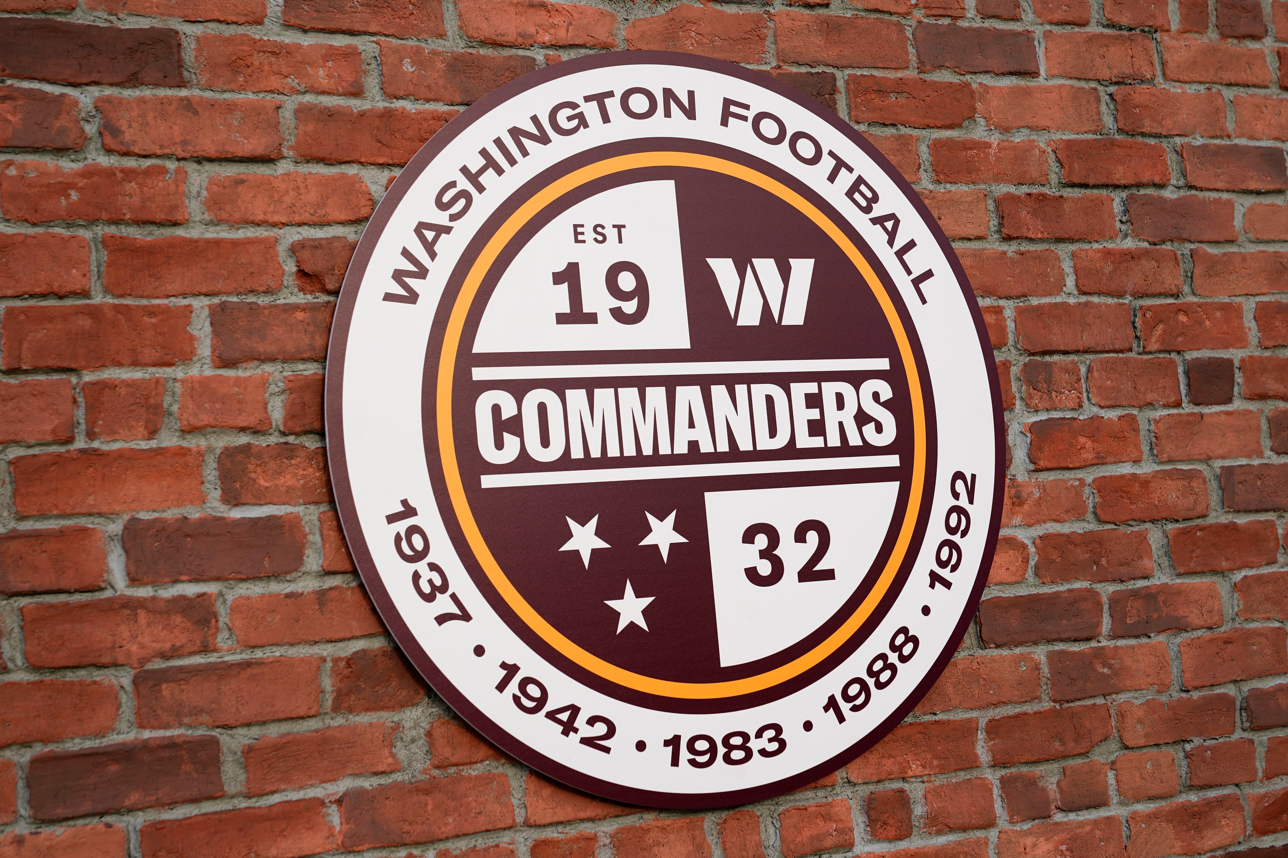 Washington Commanders jerseys are displayed at an event to unveil the NFL  football team's new identity, Wednesday, Feb. 2, 2022, in Landover, Md. The  new name comes 18 months after the once-storied