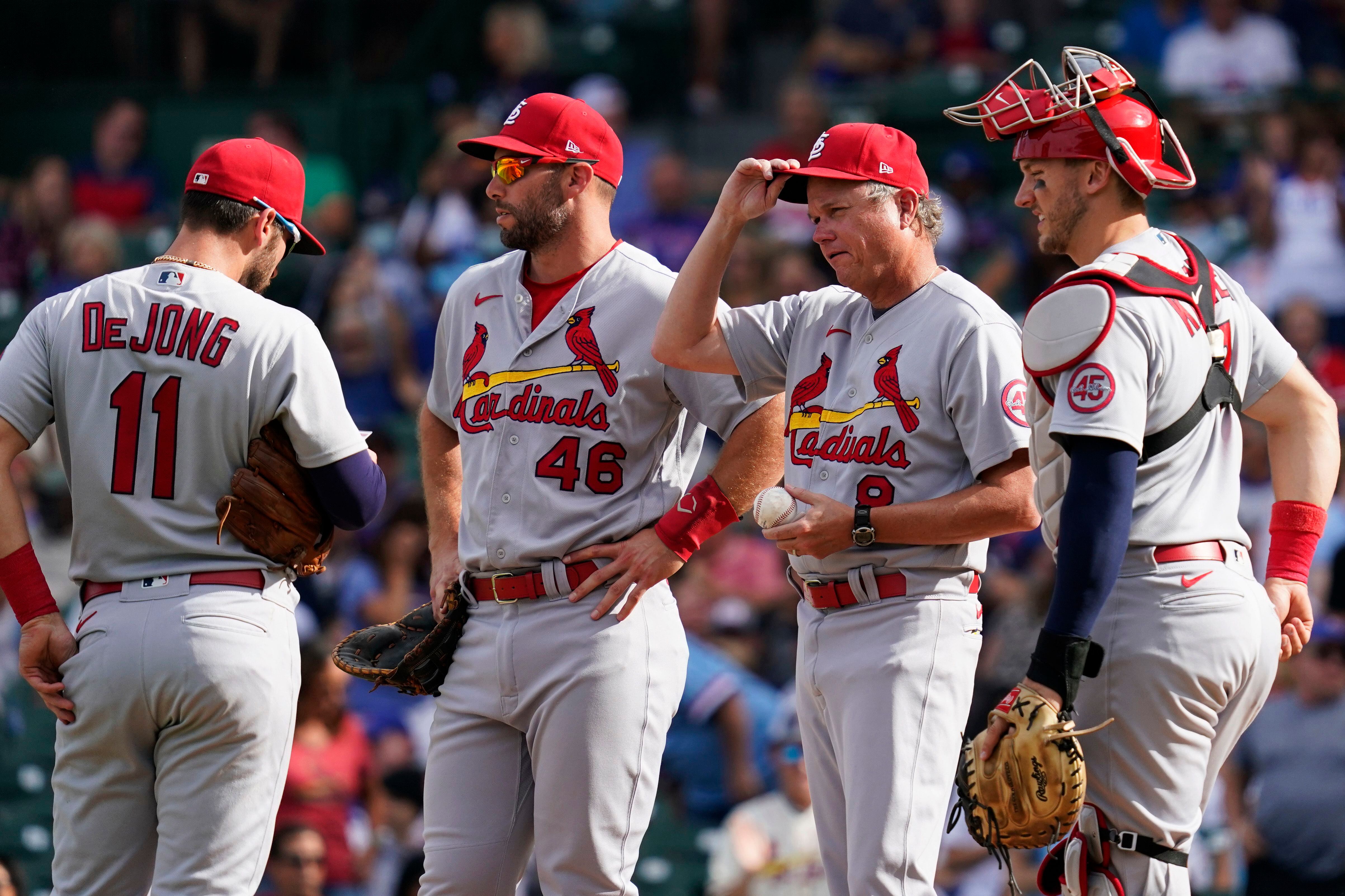 Chicago Cubs Jason Heyward scores in front of St. Louis Cardinals