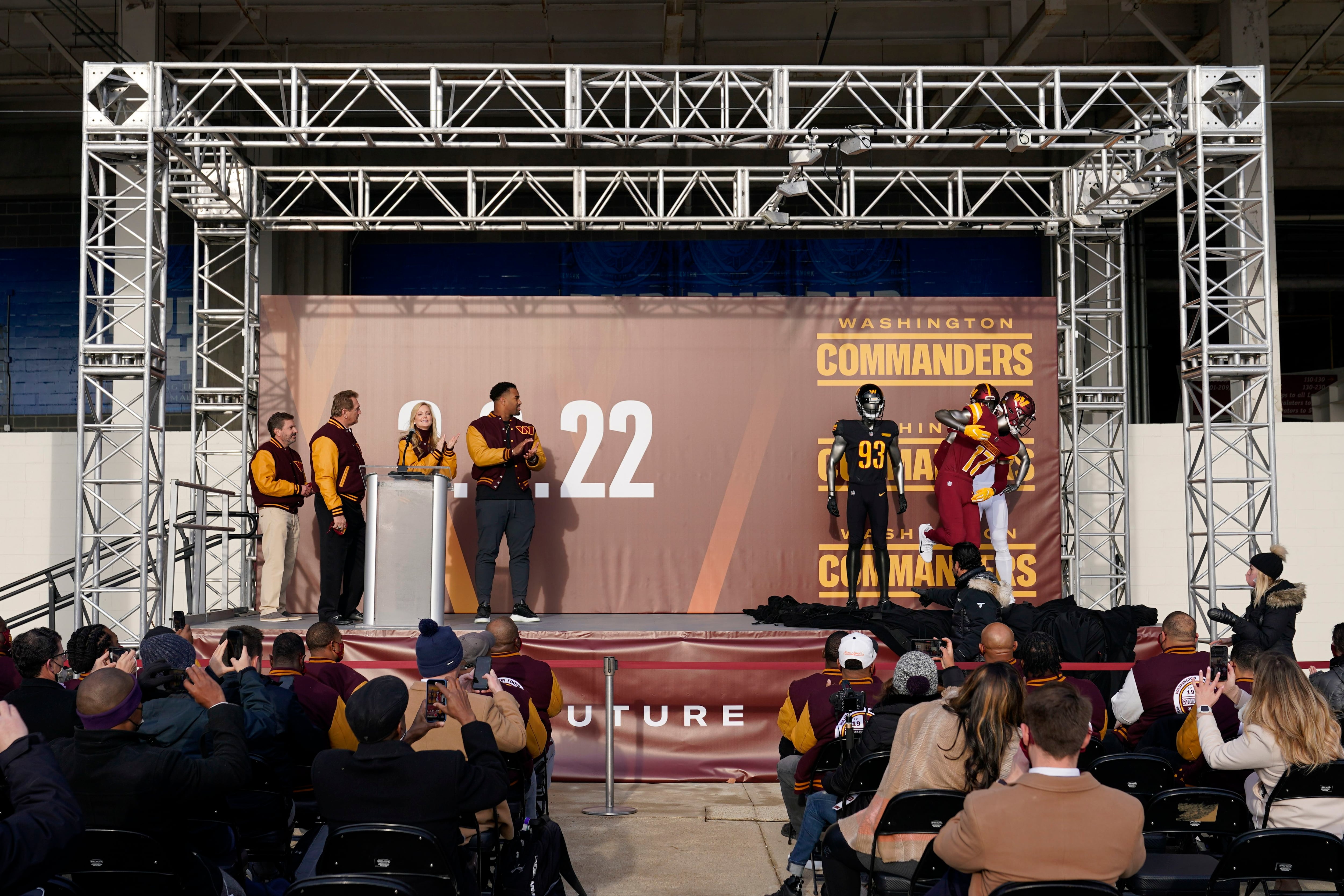 A Washington Commanders jersey is displayed at an event to unveil the NFL  football team's new identity, Wednesday, Feb. 2, 2022, in Landover, Md. The  new name comes 18 months after the