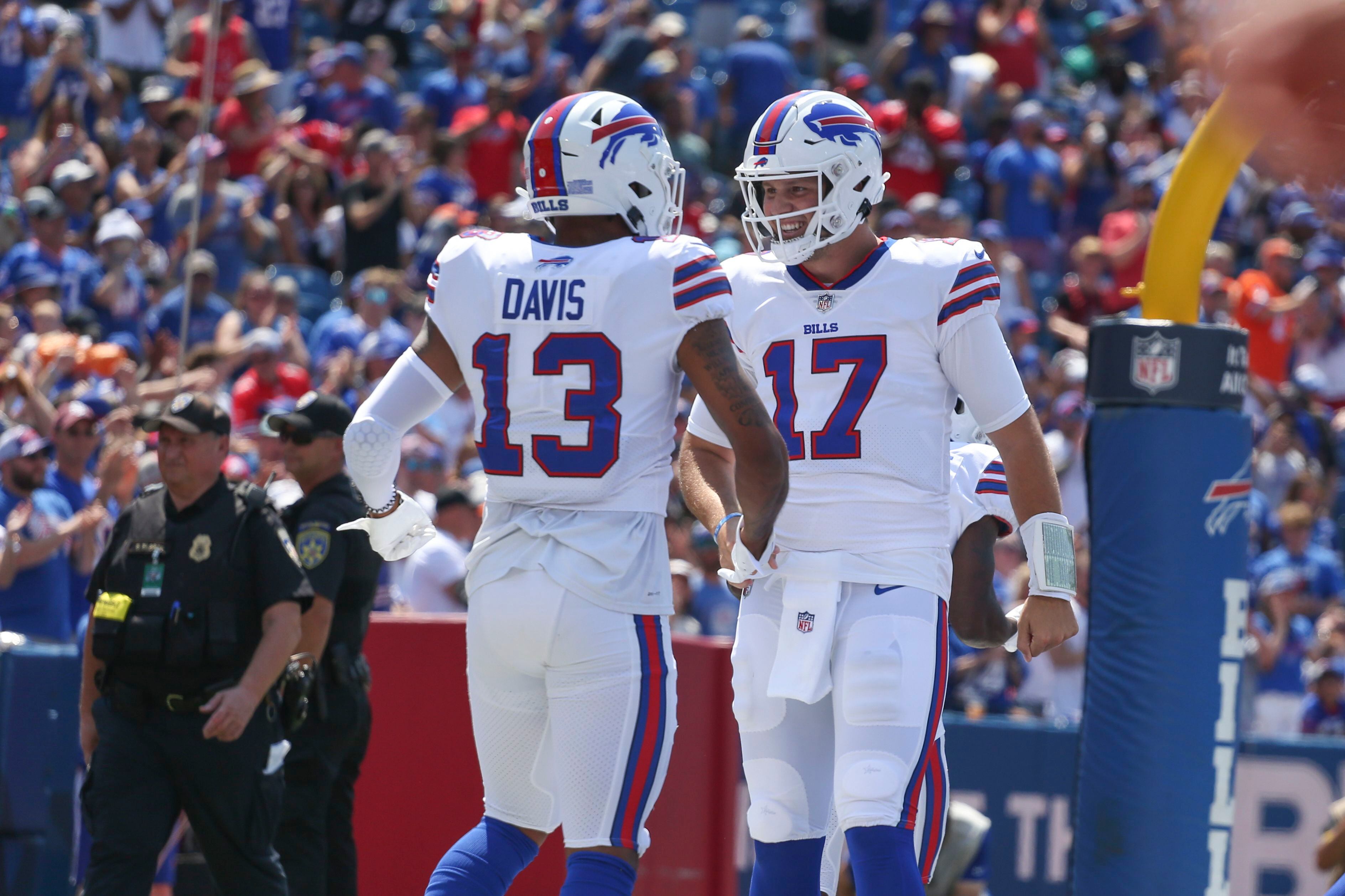 Josh Allen throws for a TD, runs for another as the Bills rout the