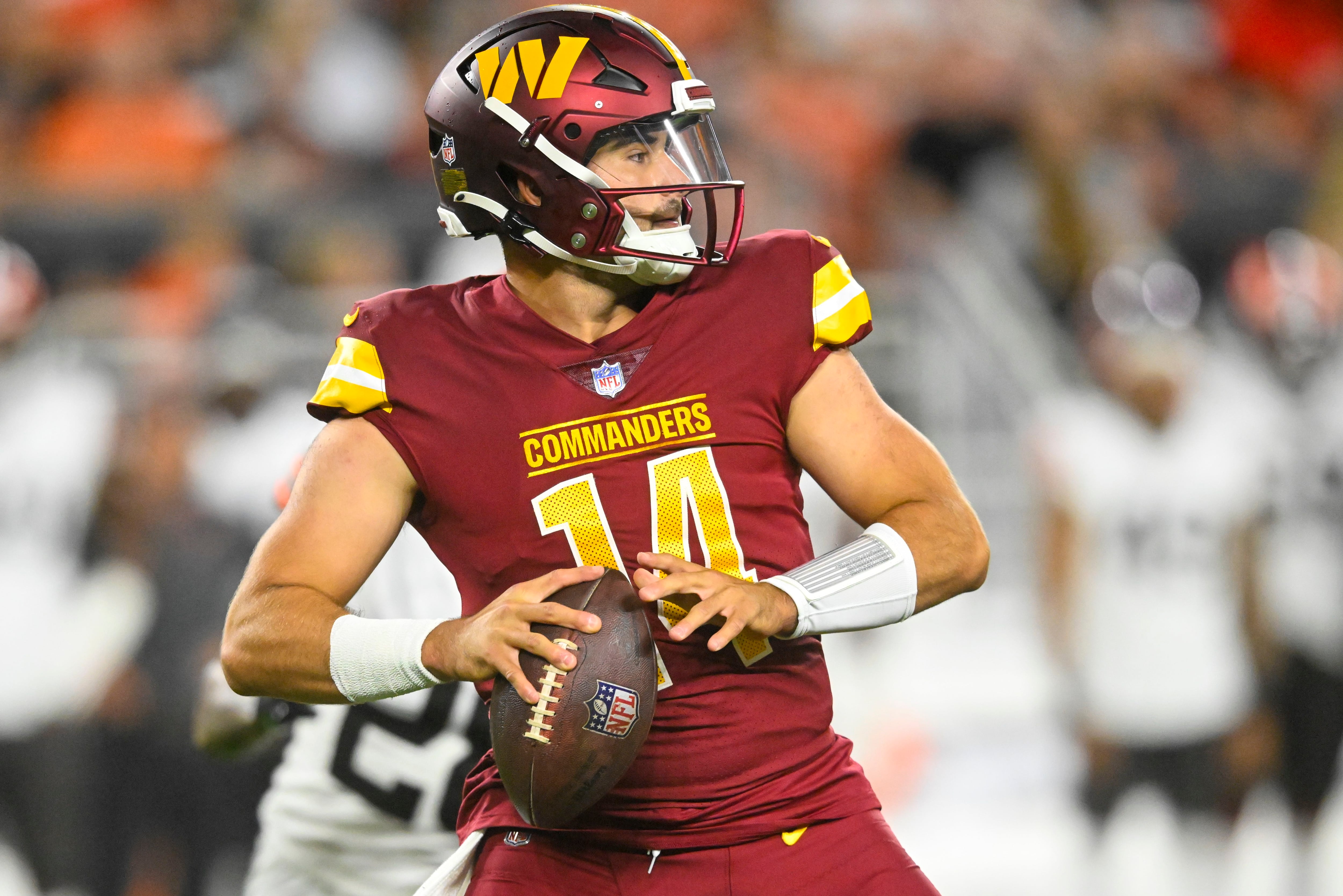 LOOK: Commanders in all-white uniforms for preseason debut