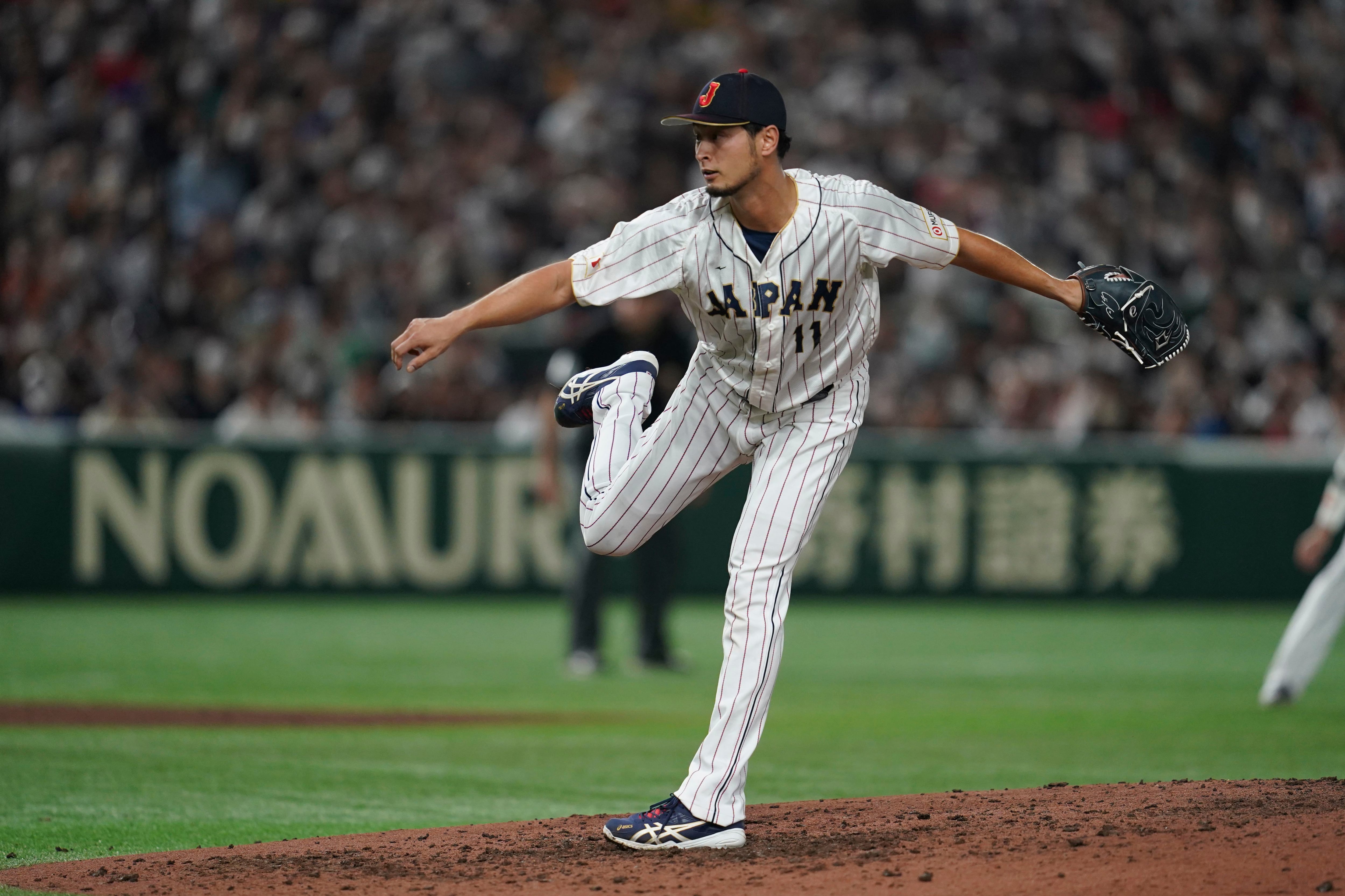 Shohei Ohtani of Japan reacts as Italy's shortstop Nicky Lopez