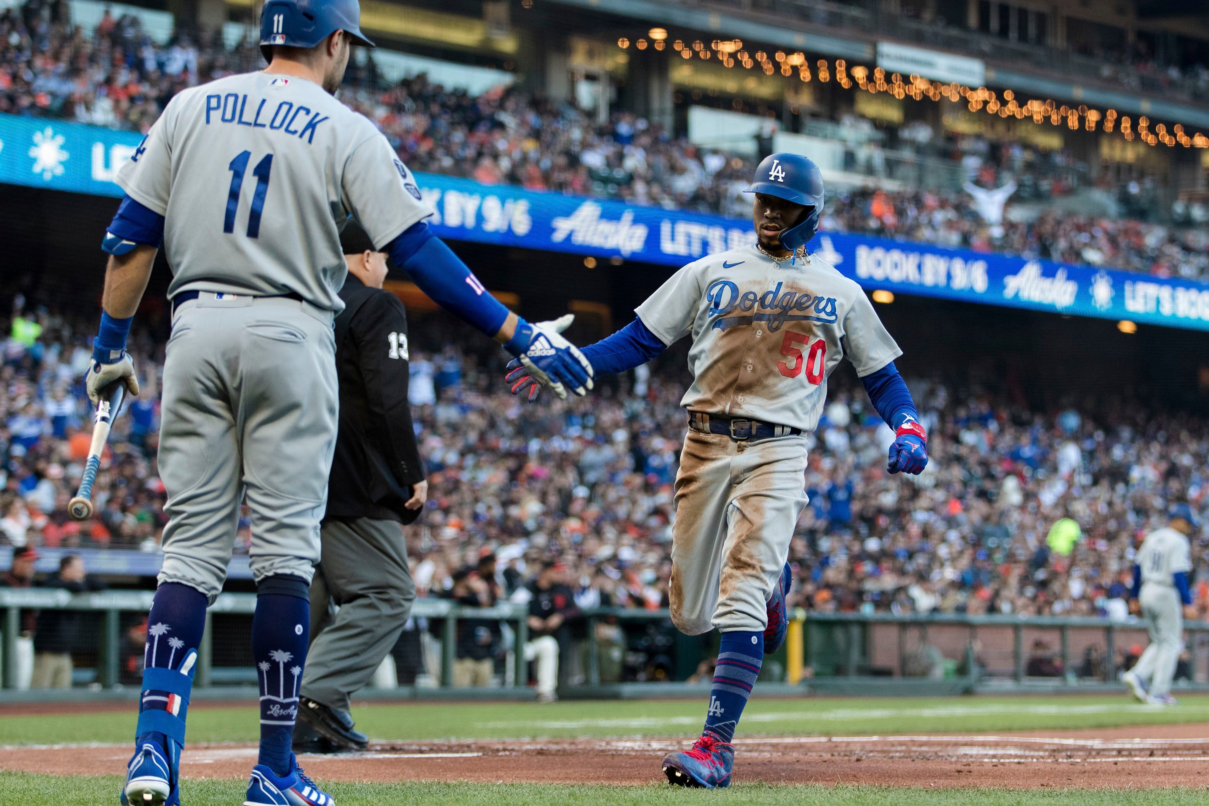 Dodgers beat Giants 6-1, move into tie for first in NL West