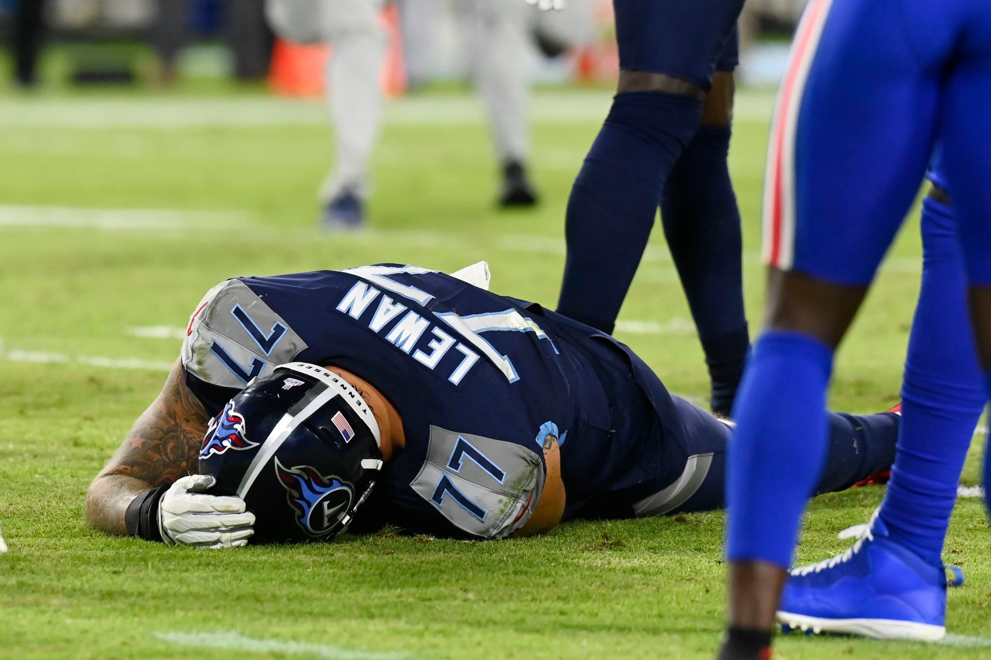 Titans left tackle Taylor Lewan confirms he tore his ACL