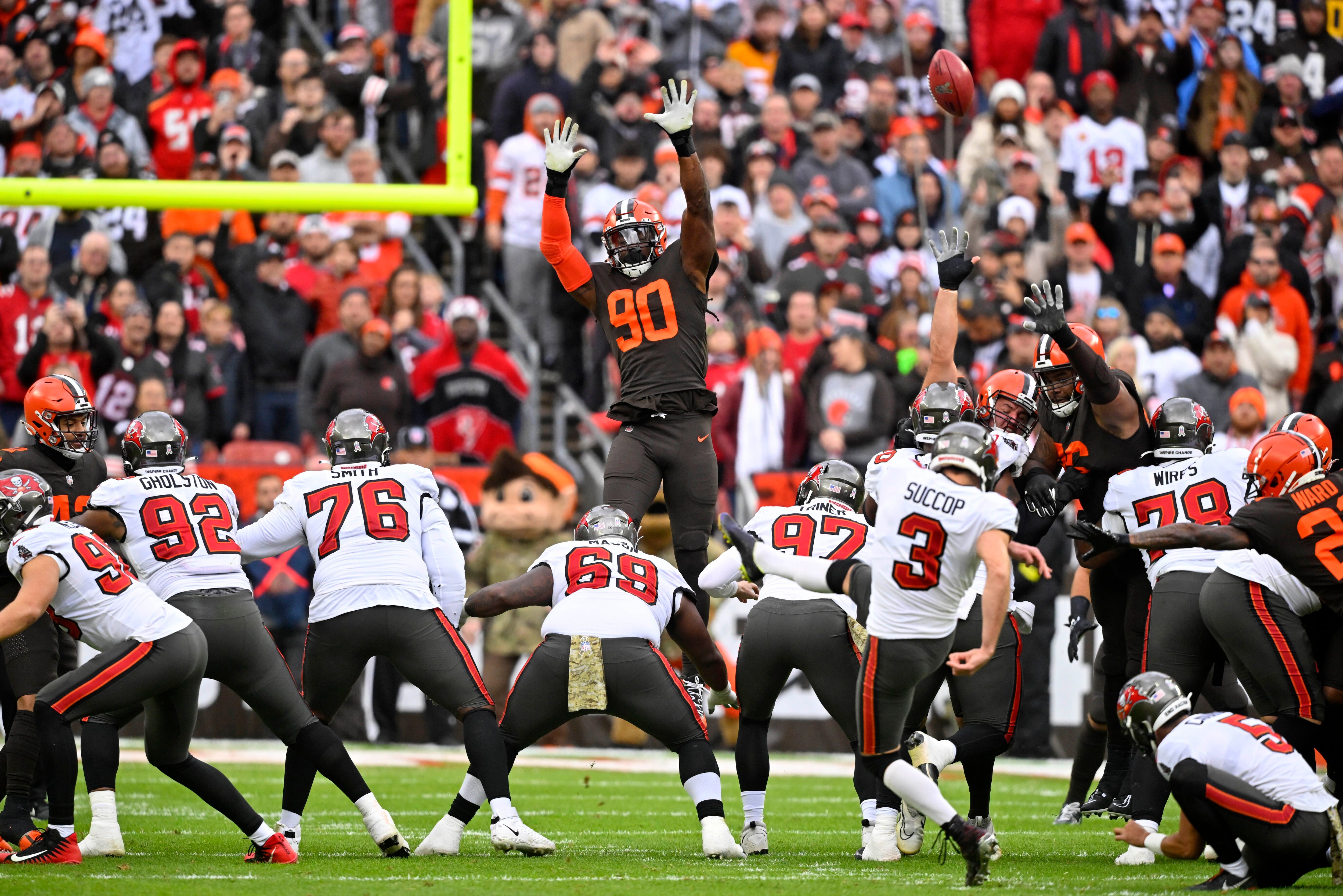 Cleveland Browns running back Nick Chubb, right, scores a touchdown in  overtime of the team's NFL football game against the Tampa Bay Buccaneers  in Cleveland, Sunday, Nov. 27, 2022. The Browns won