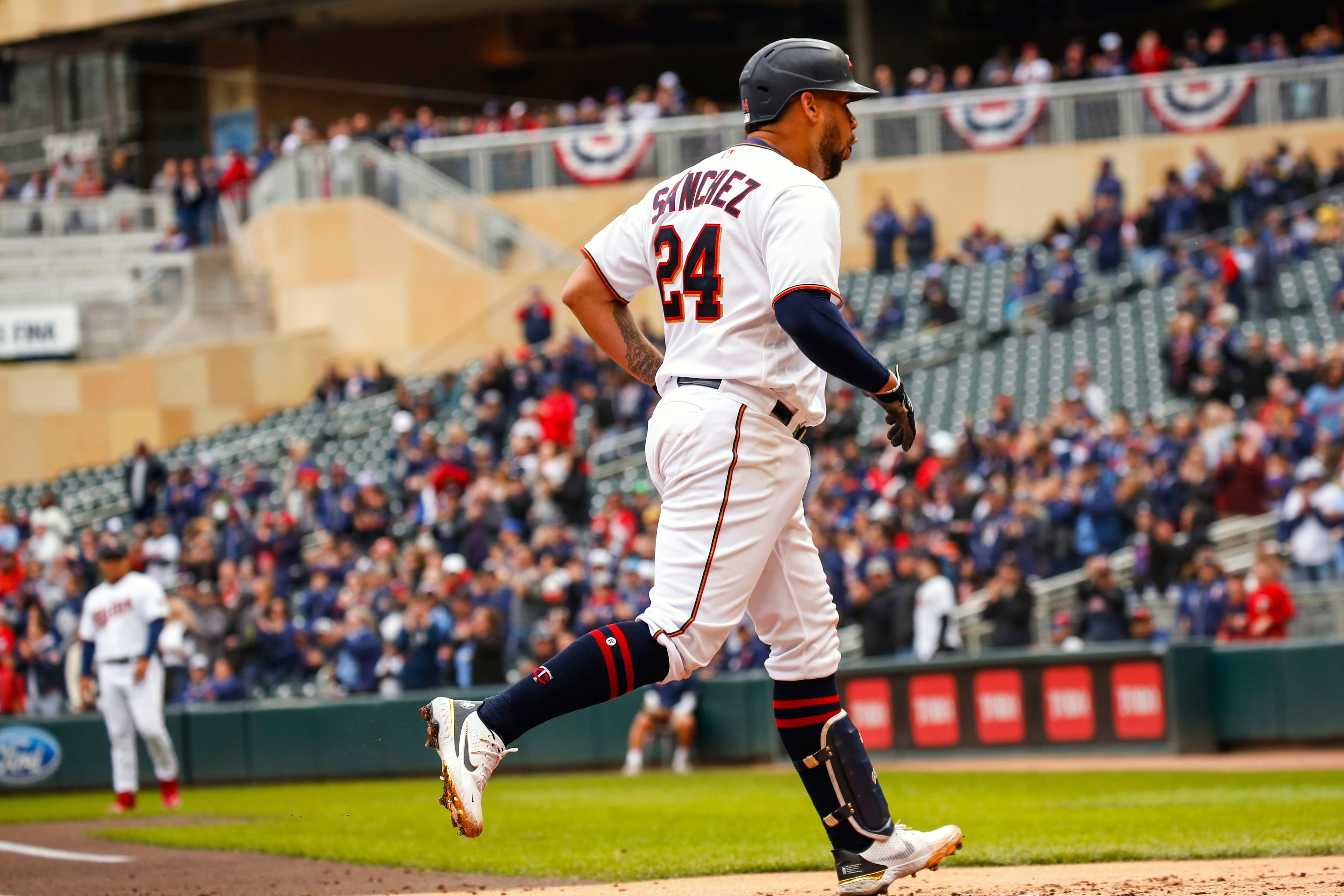 Gio Urshela of the Minnesota Twins steals second base in the sixth