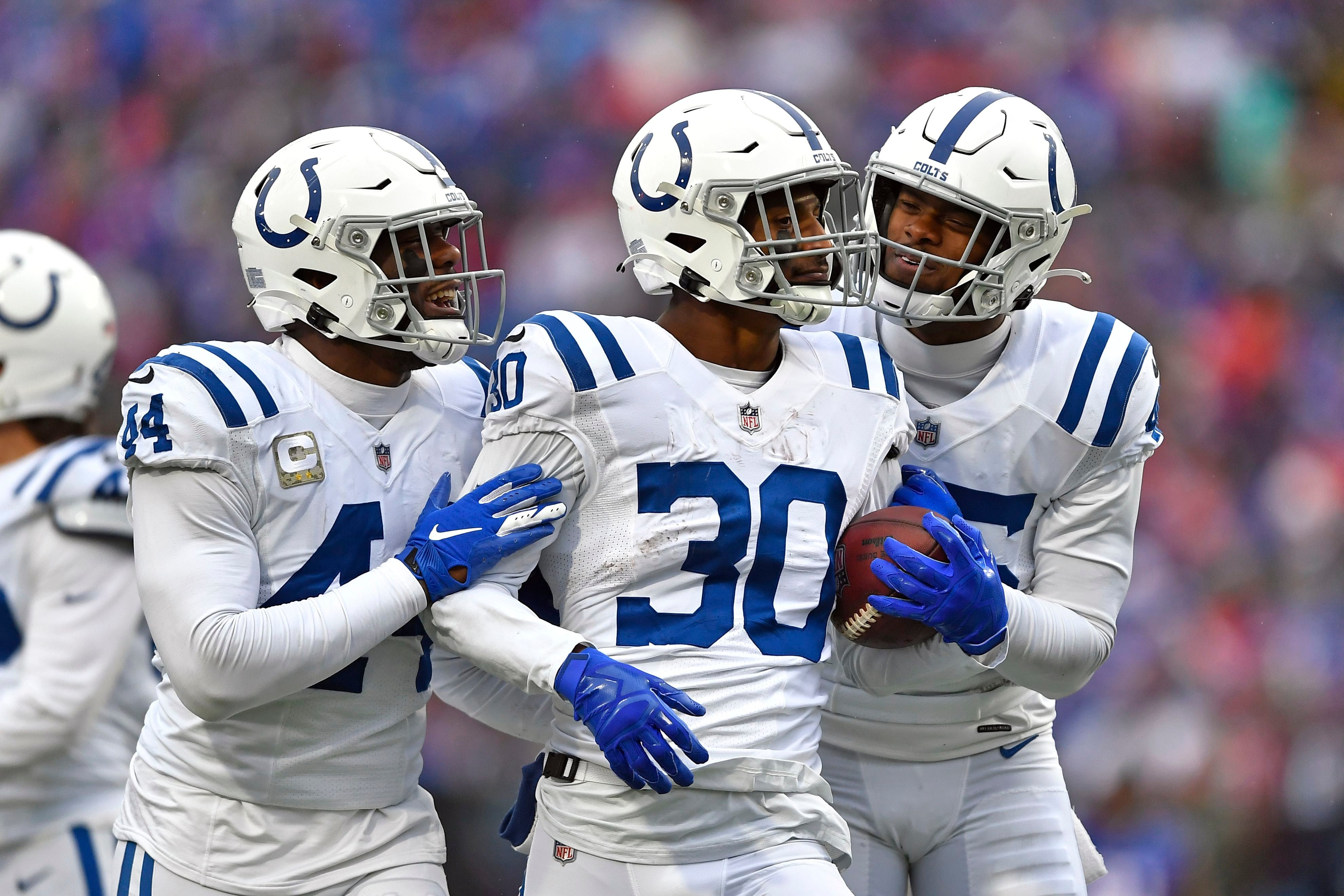 Taylor runs up the score with 5 TDs; Colts beat Bills 41-15