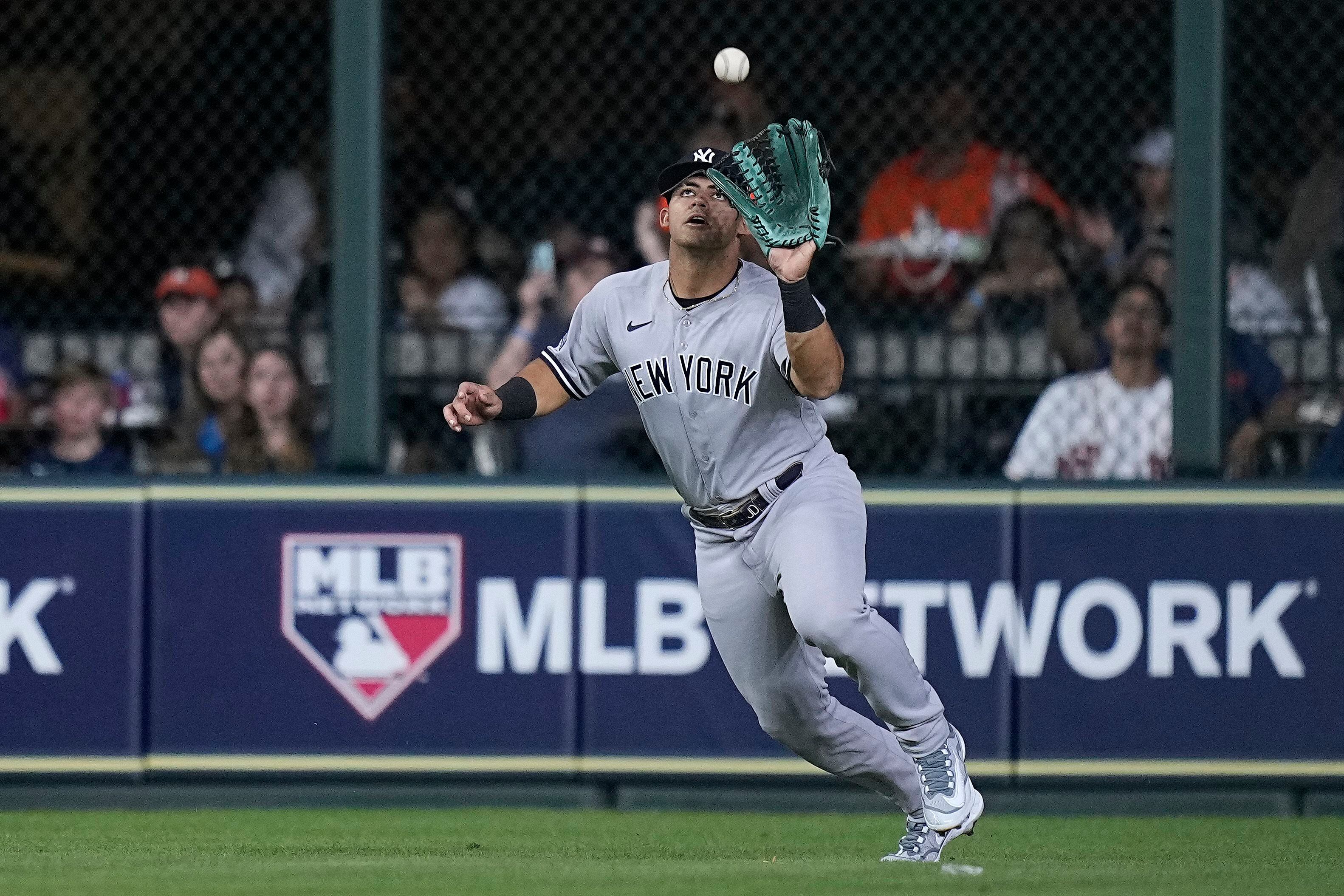 AP Source: Yankees place outfielder Harrison Bader on waivers