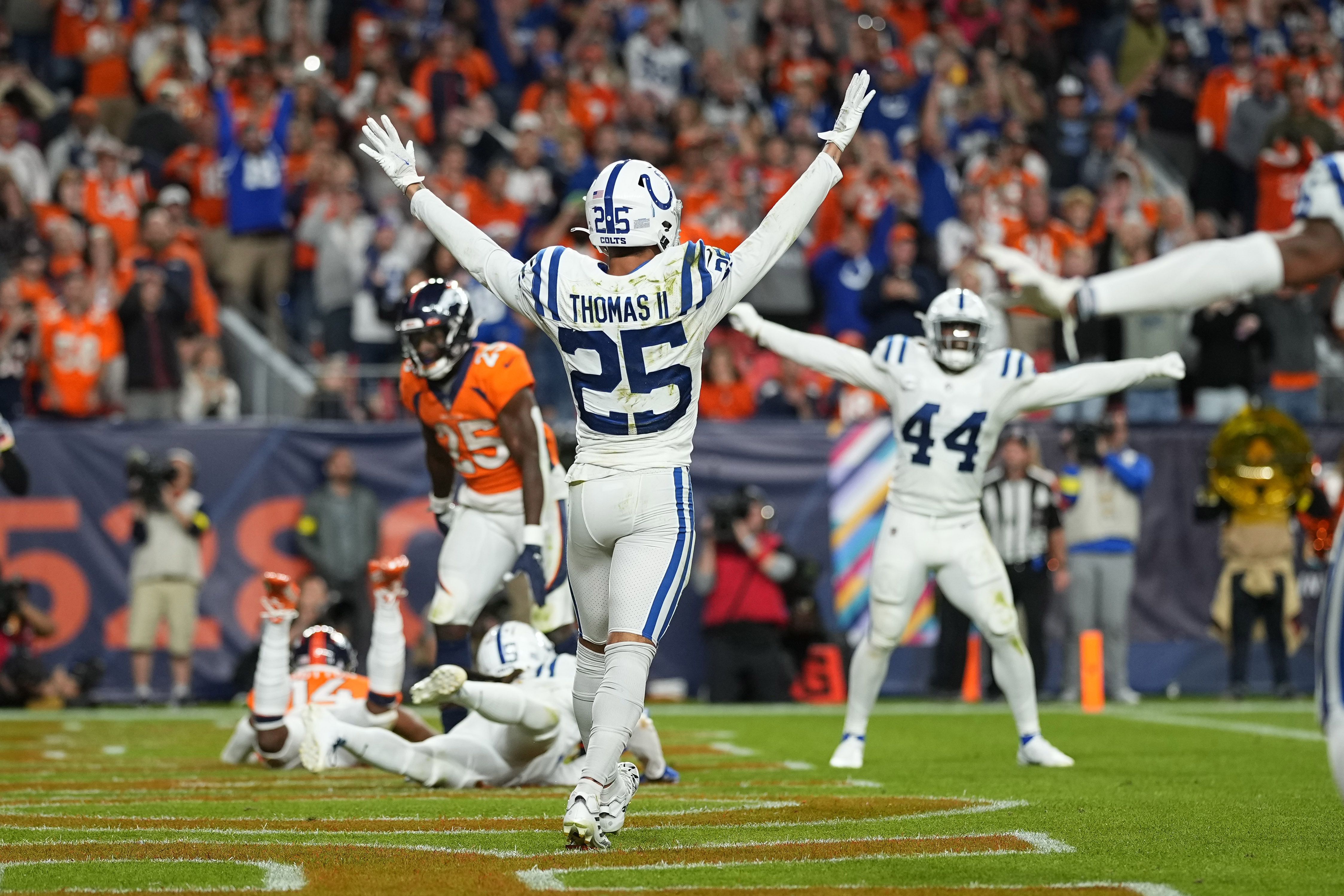 Denver Broncos linebacker Josey Jewell (47) can't make the catch as  Indianapolis Colts linebacker Zaire Franklin (44) pressures during the  second half of an NFL football game, Thursday, Oct. 6, 2022, in