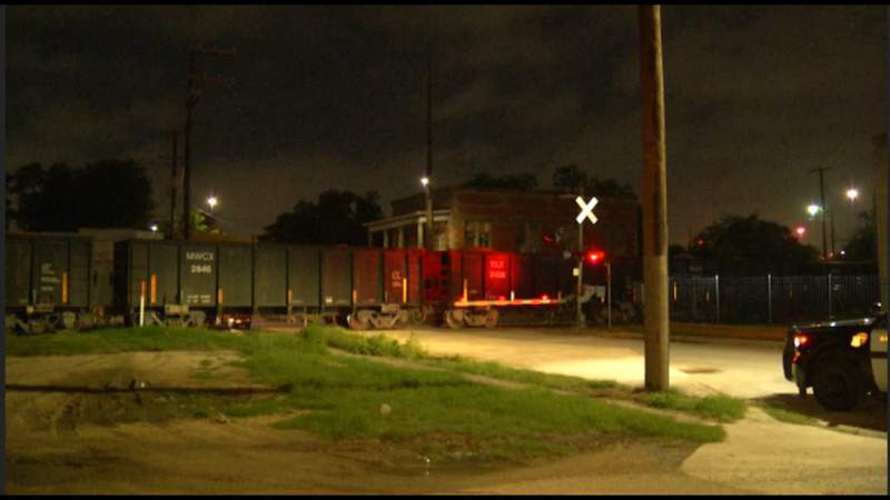 Woman hospitalized after walking into side of moving train, police say