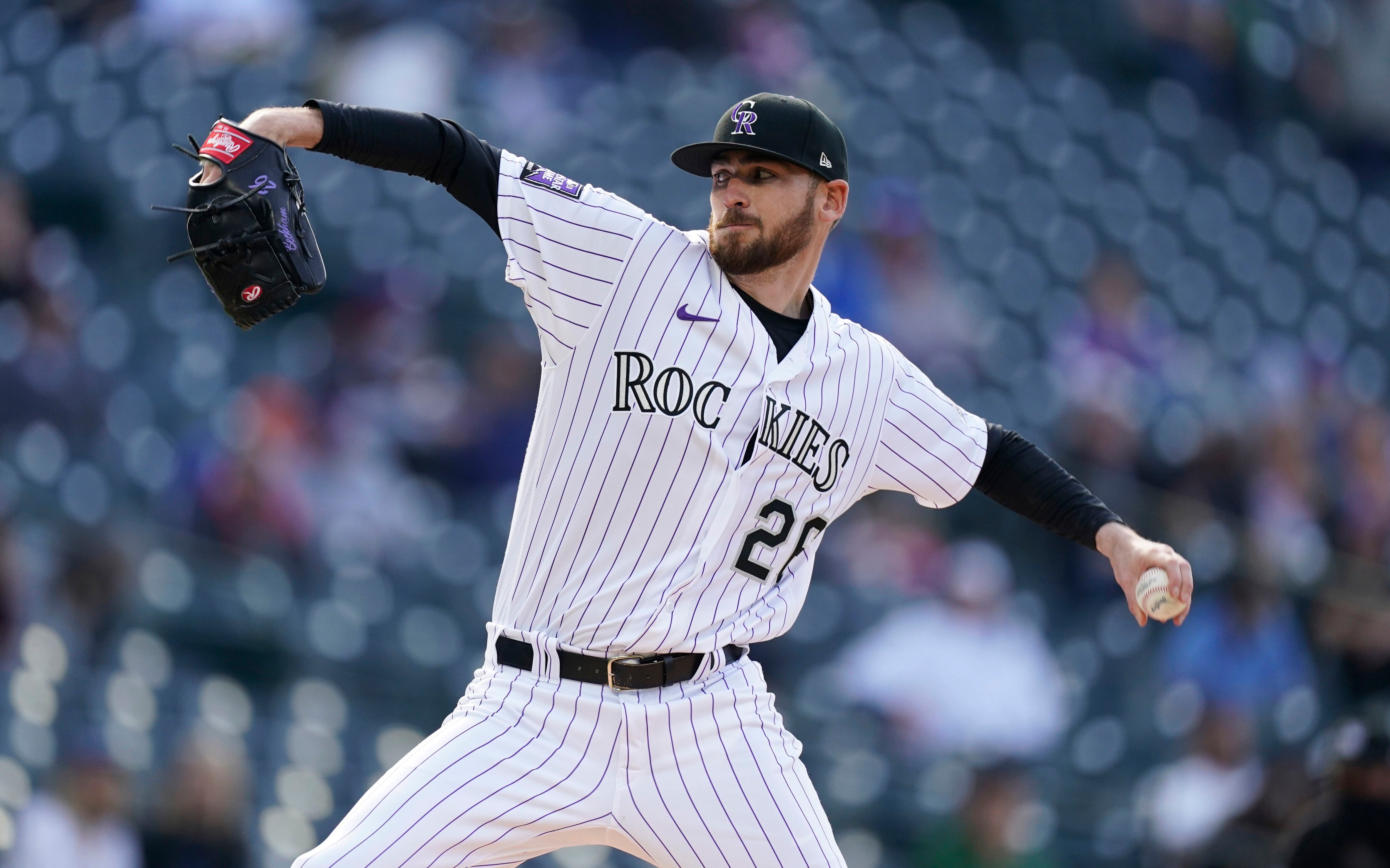 Fuentes, Rockies split doubleheader with virus-short Padres