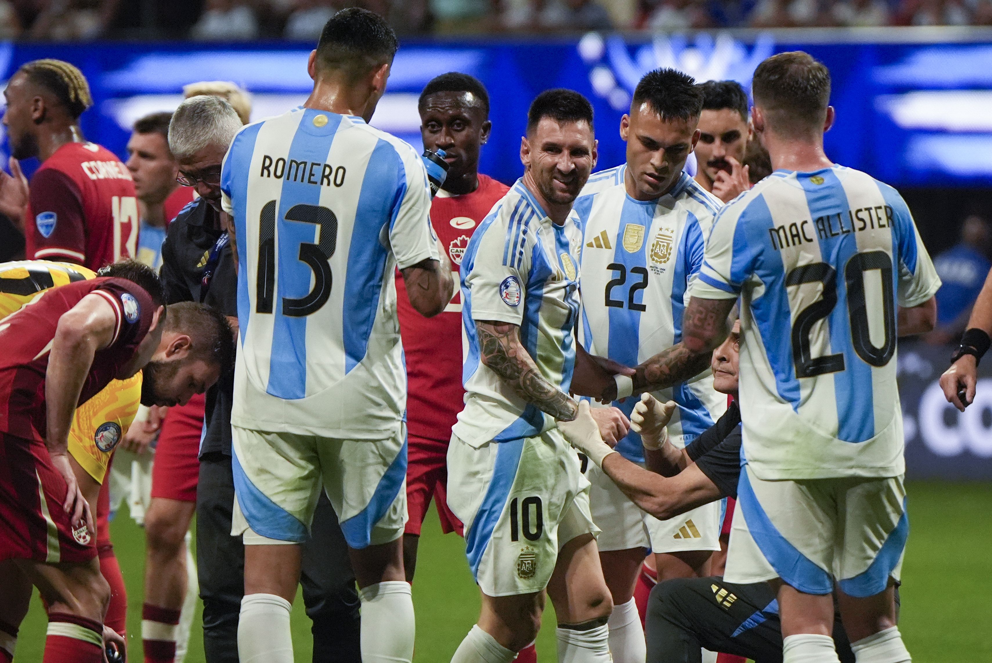 Messi and Argentina overcome Canada and poor surface, start Copa America  title defense with 2-0 win