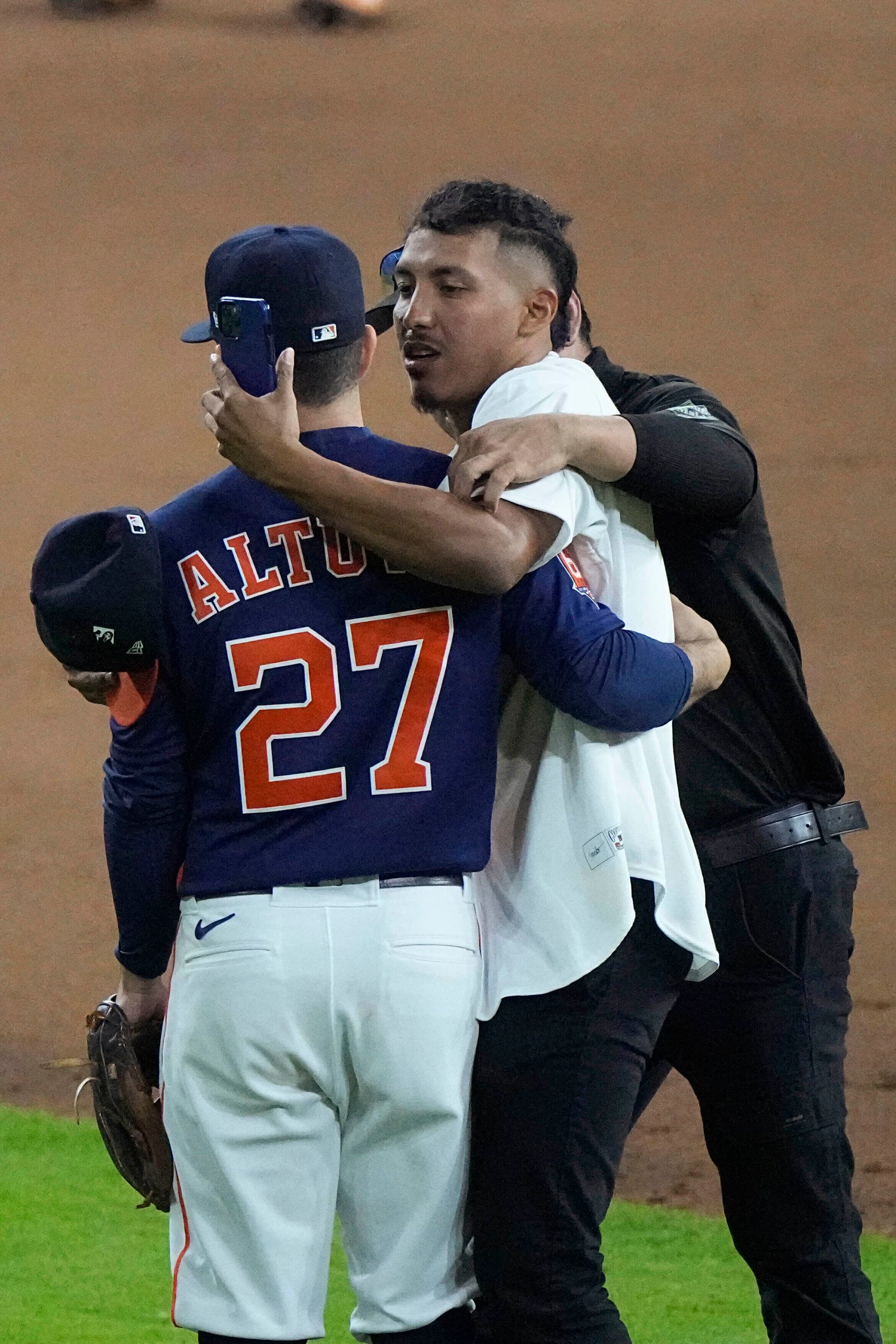 Watch: Crazed Fan Runs Onto Field, Hugs Houston Astros' Jose Altuve