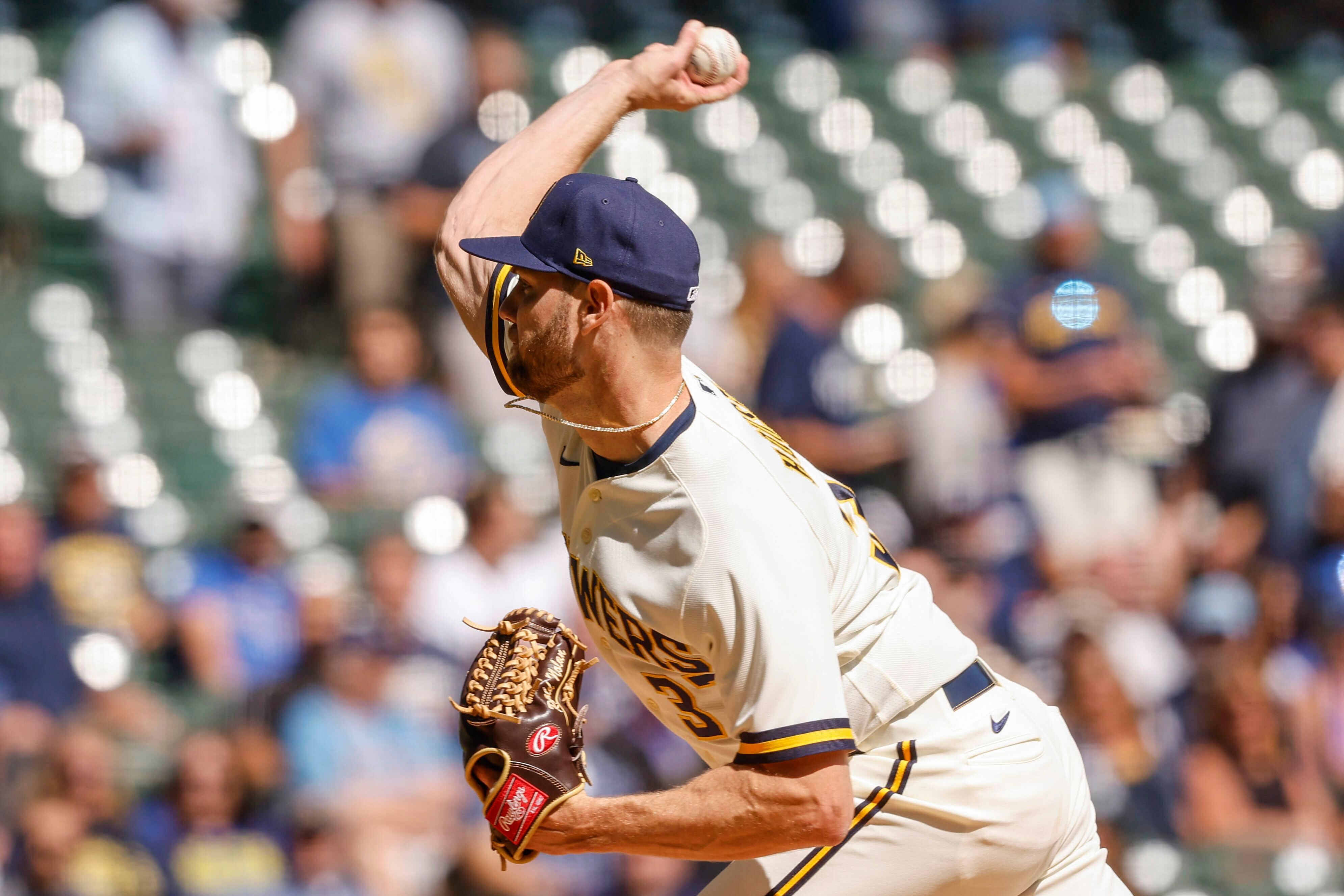 Taylor homers, Houser pitches NL Central champion Brewers past