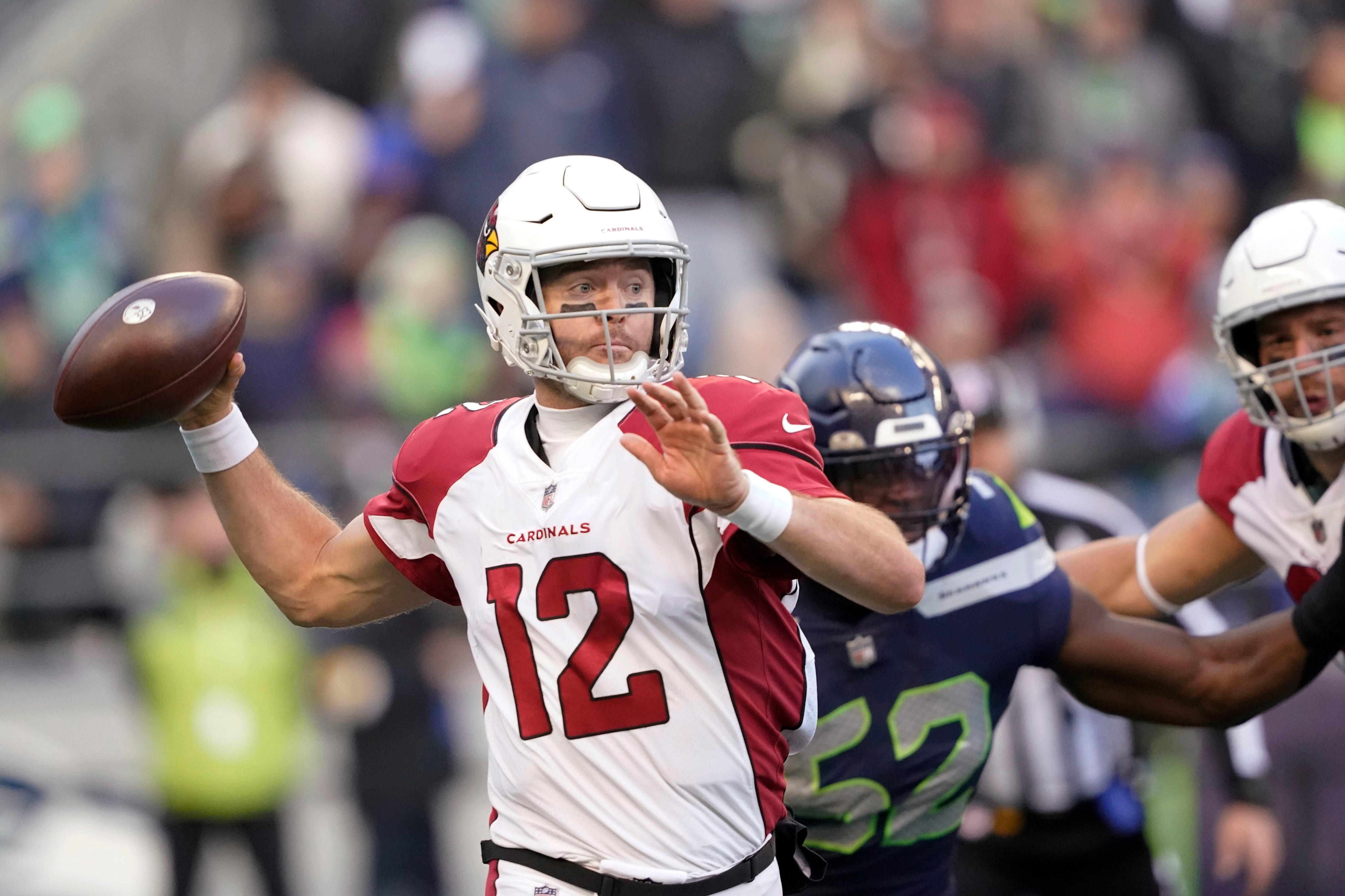 Texas ex Colt McCoy leads the Cardinals to a 23-13 win over the Seahawks