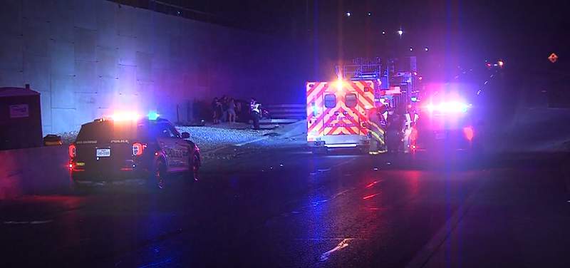 Man hospitalized after vehicle goes through construction zone, crashes into wall, police say