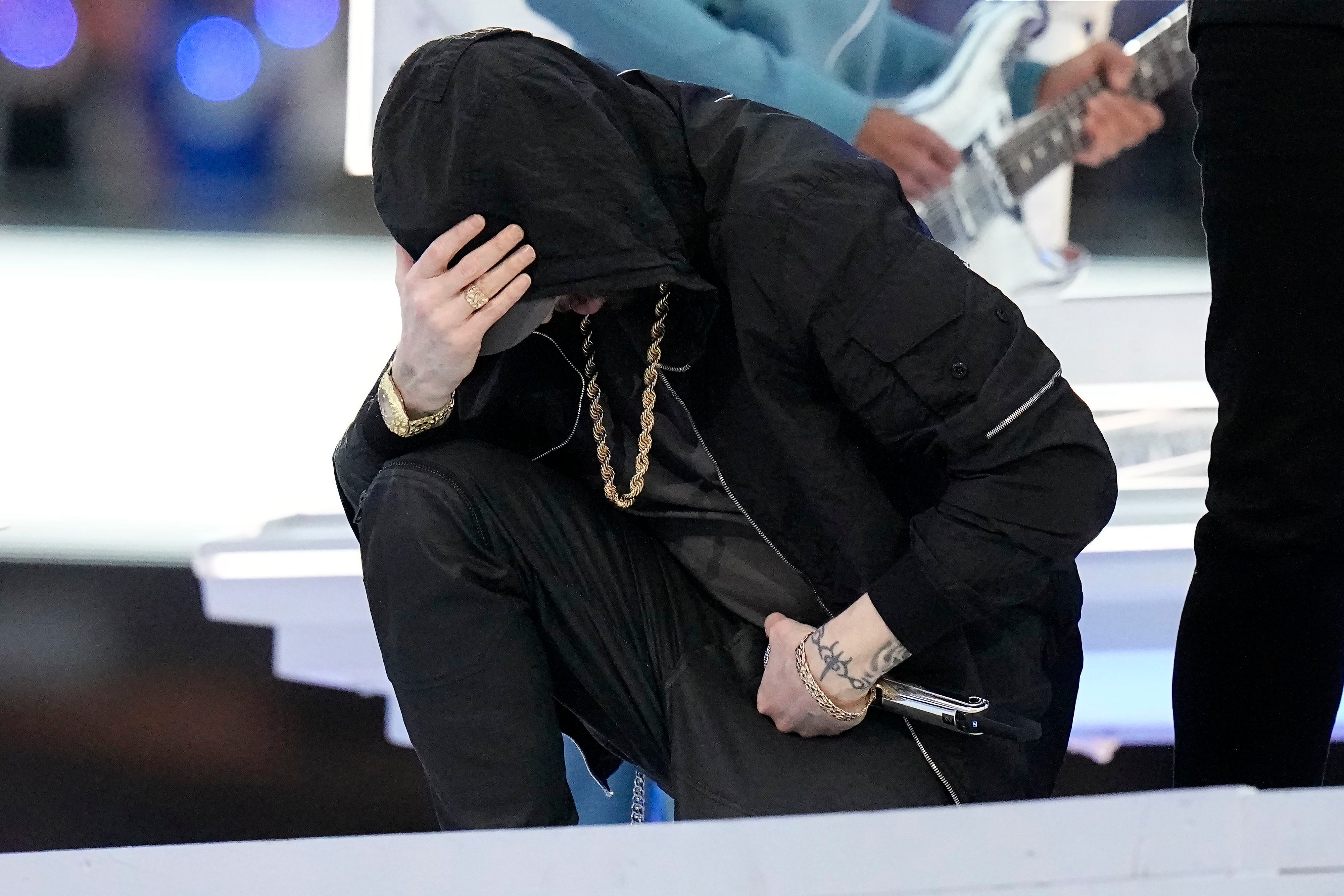 Eminem kneels at Super Bowl's high-wattage hip-hop halftime show