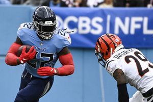 Burrow's TD pass to Higgins lifts Bengals over Titans 20-16