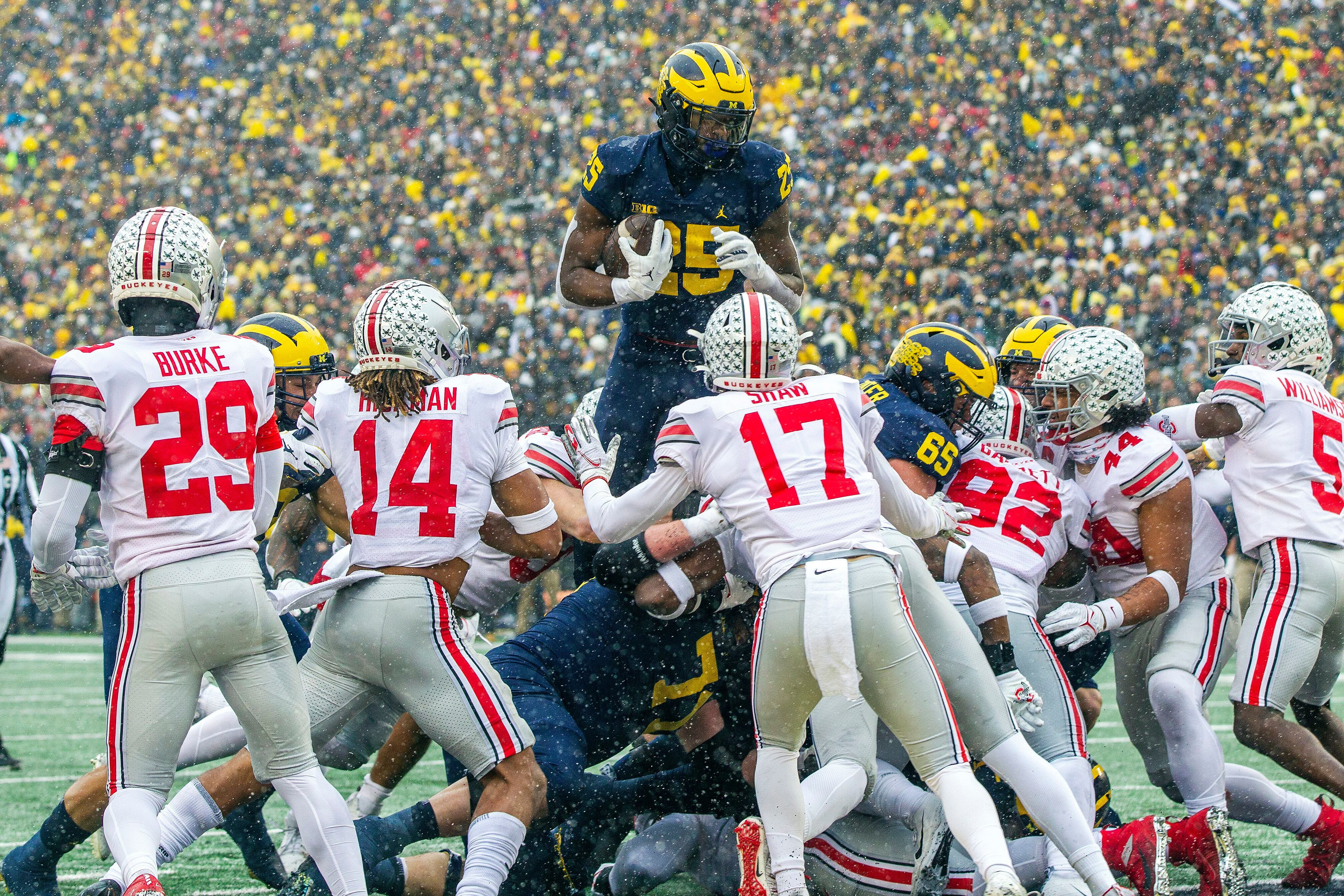 Michigan beats Ohio State 42 27 ends 8 game skid in rivalry