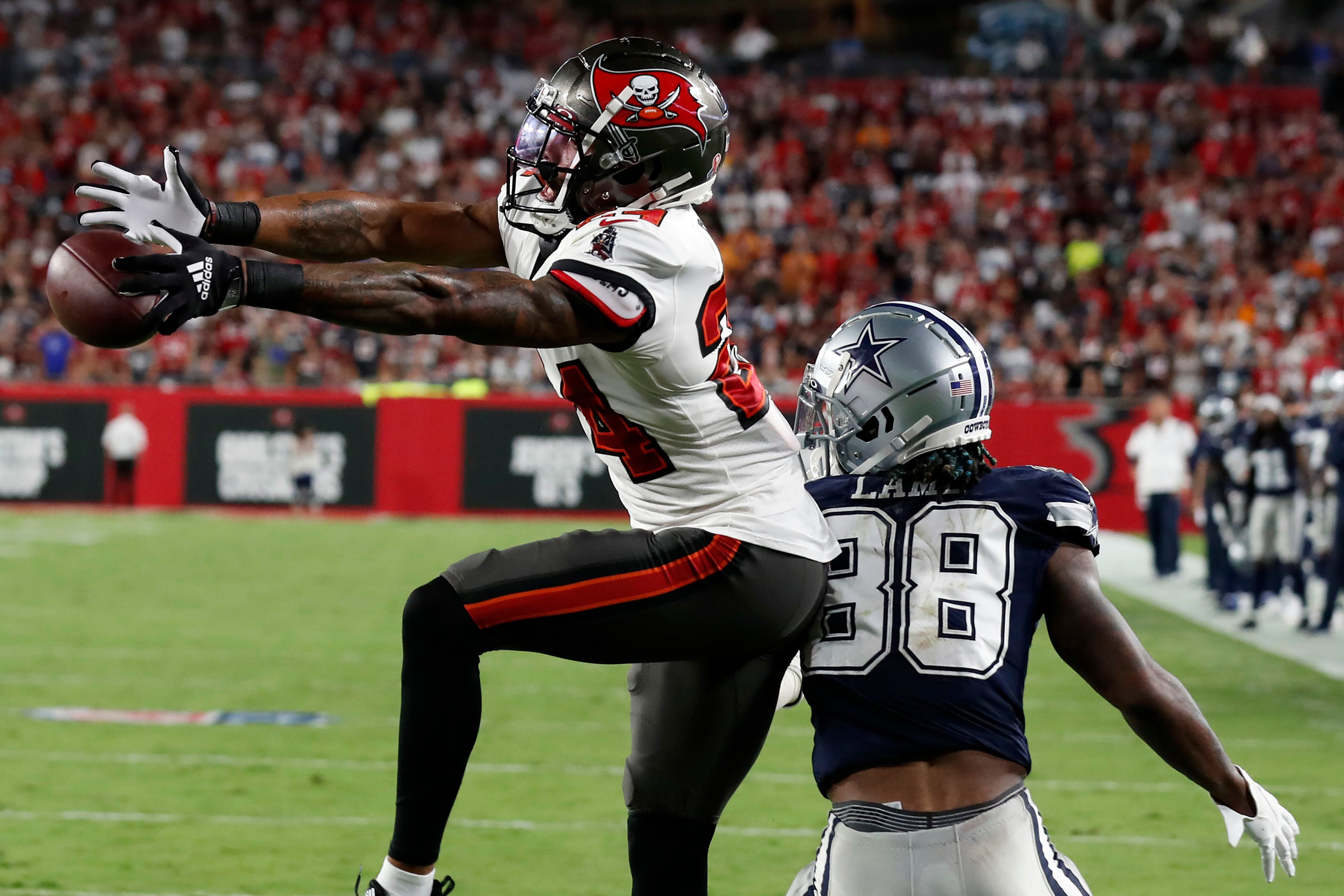 Tom Brady throws for 379 yards, 4 TDs, Bucs beat Cowboys 31-29 – The Denver  Post