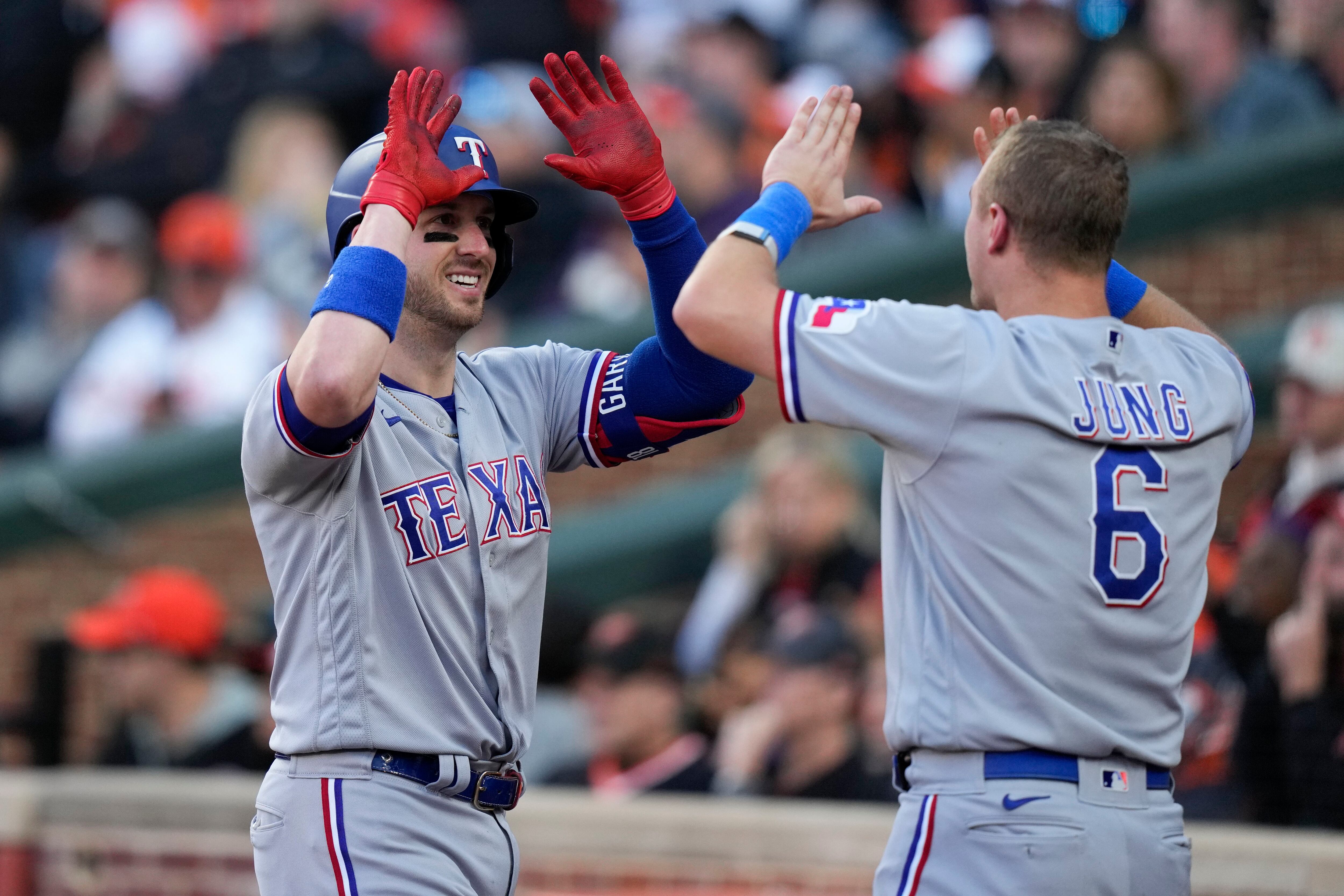 Texas' bullpen escapes late to edge Orioles in ALDS