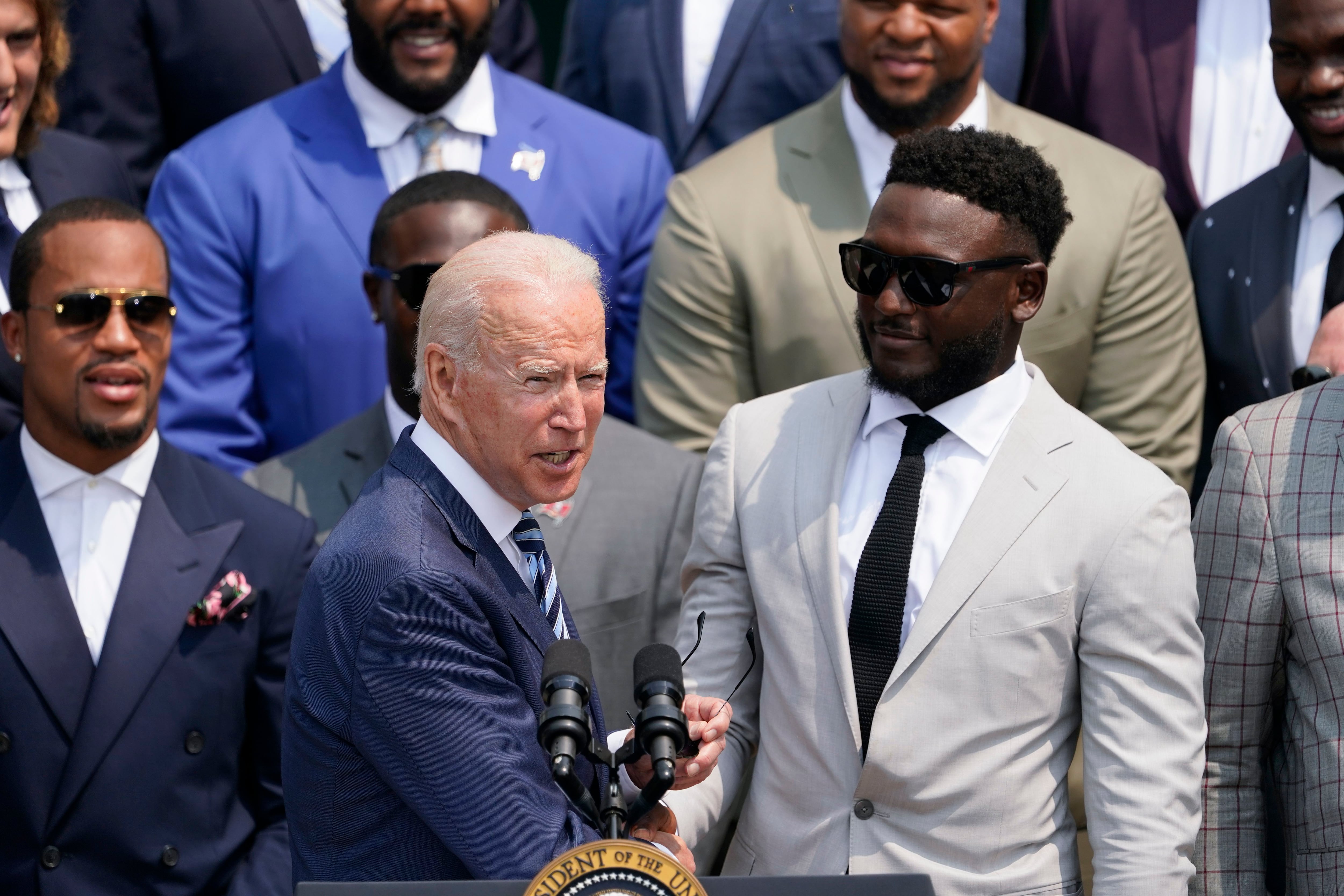 Washington, United States. 20th July, 2021. U.S. President Joe Biden, holds  a number 46 jersey handed to him by Super Bowl Champions Tampa Bay  Buccaneers owner Bryan Glazer, on the South Lawn