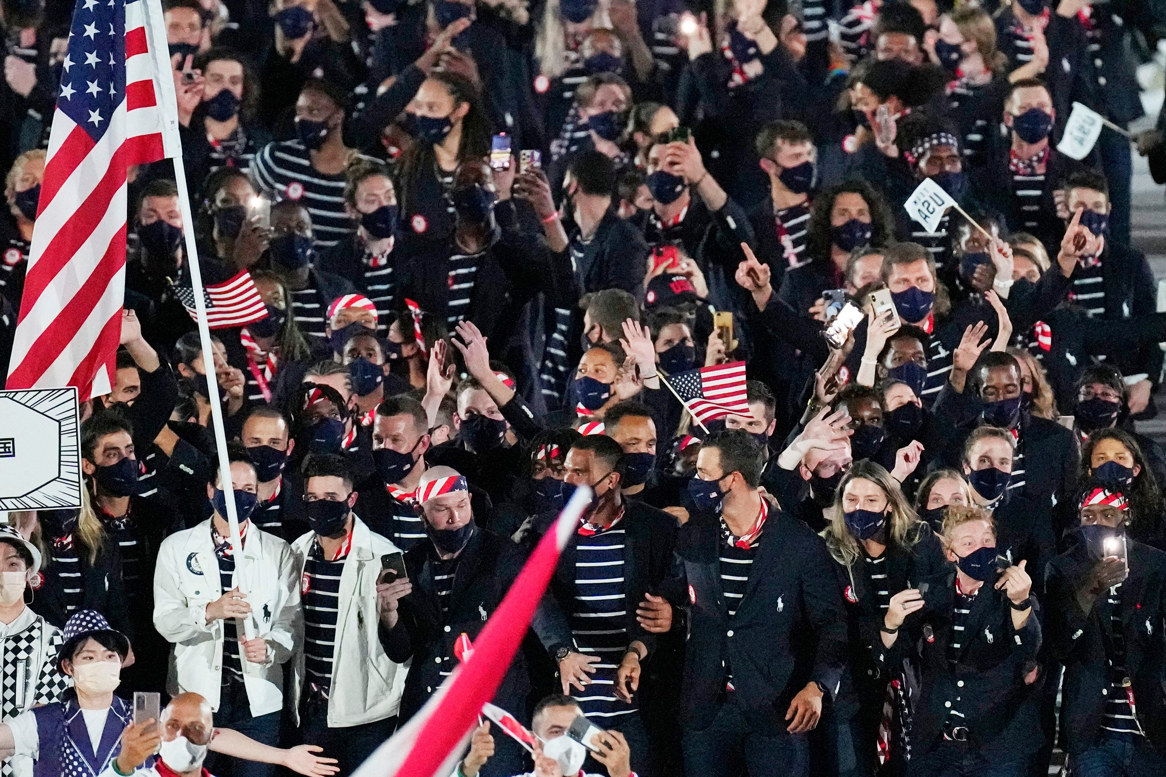 Hideki Matsui carries torch at Olympic Opening Ceremony