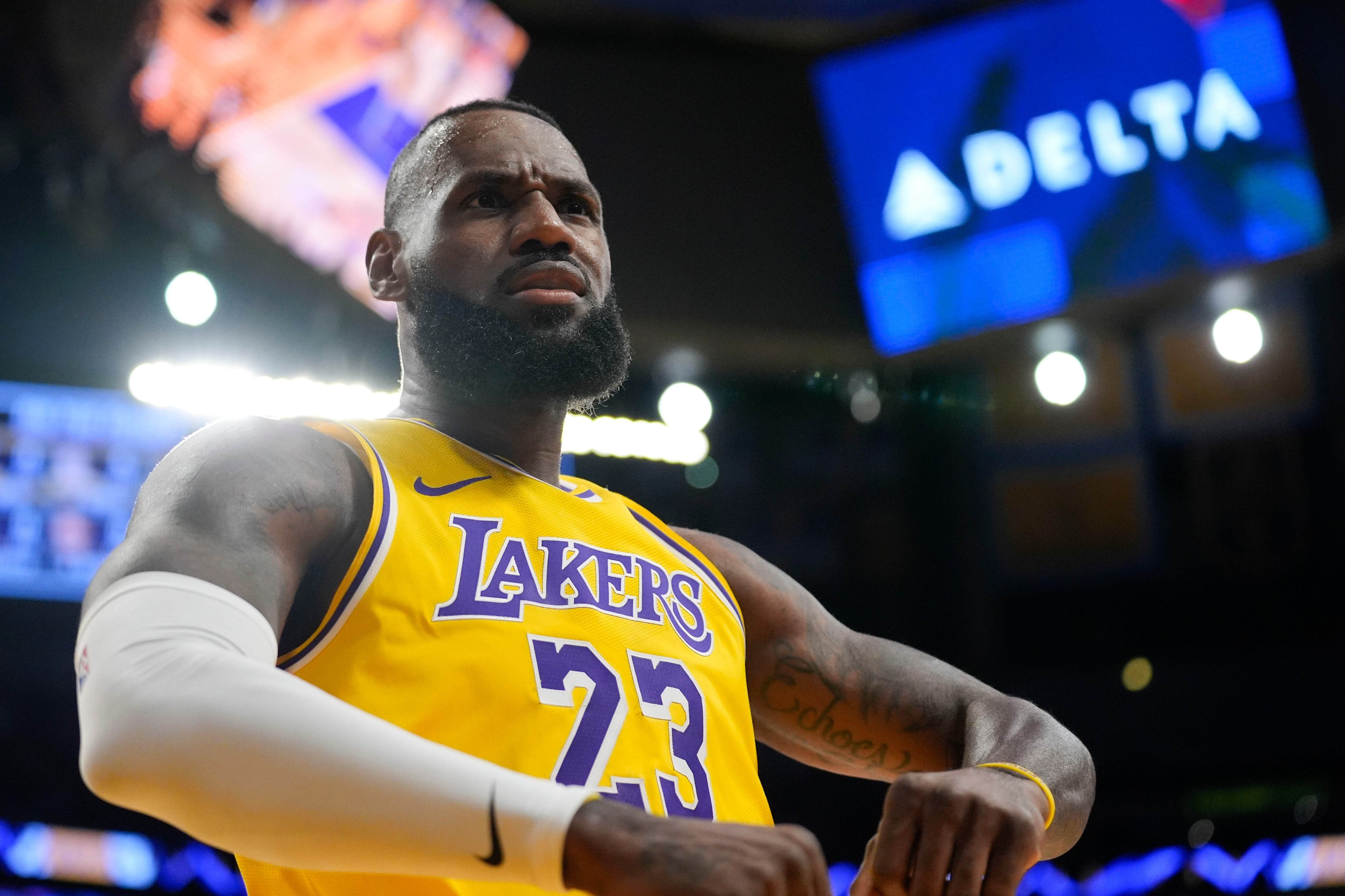 LeBron James sits out Lakers' showdown with Milwaukee Bucks due to his  balky ankle