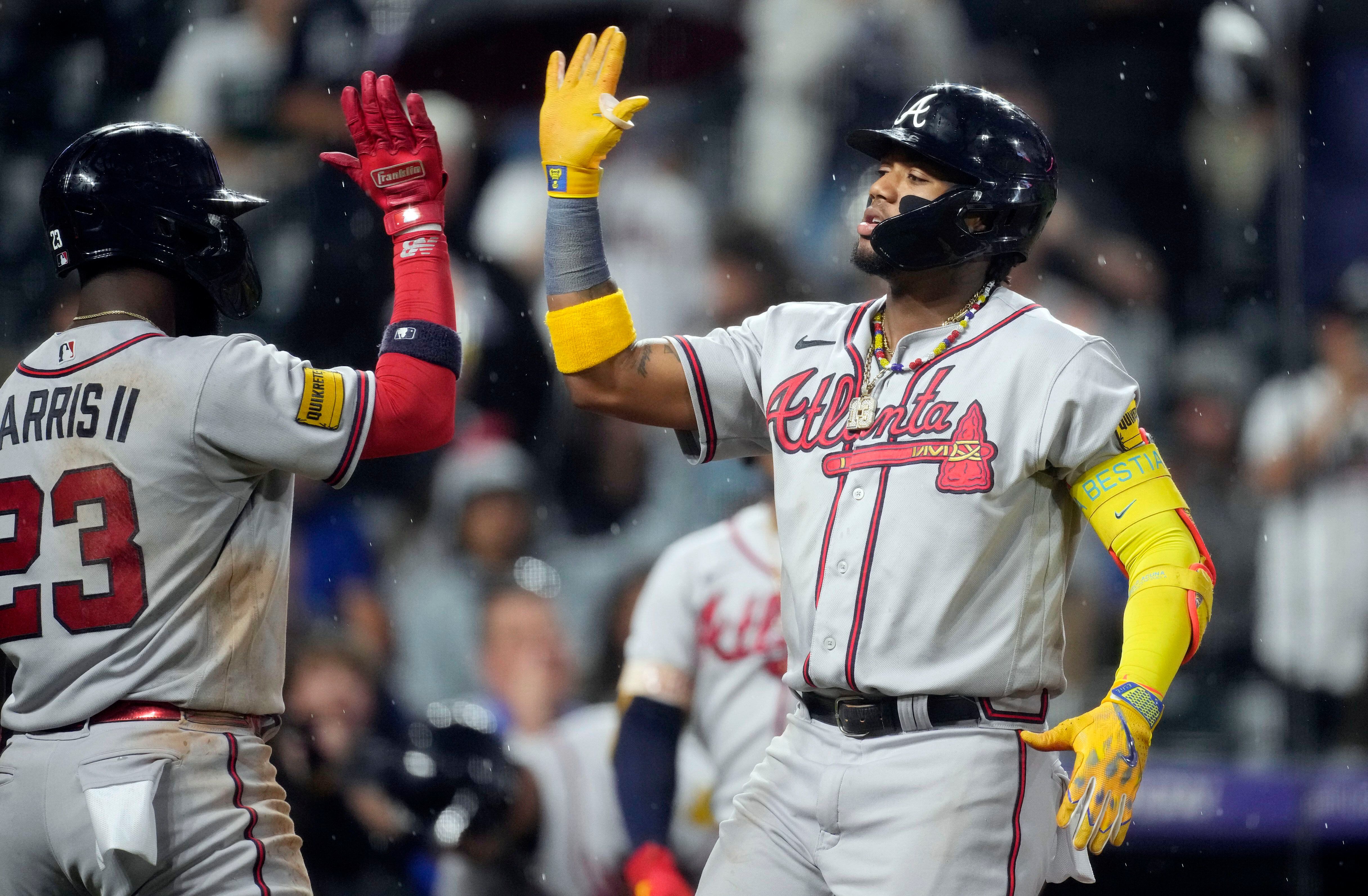 Ronald Acuña Jr. knocked over by fan charging field in Colorado, but Braves  star says he's OK