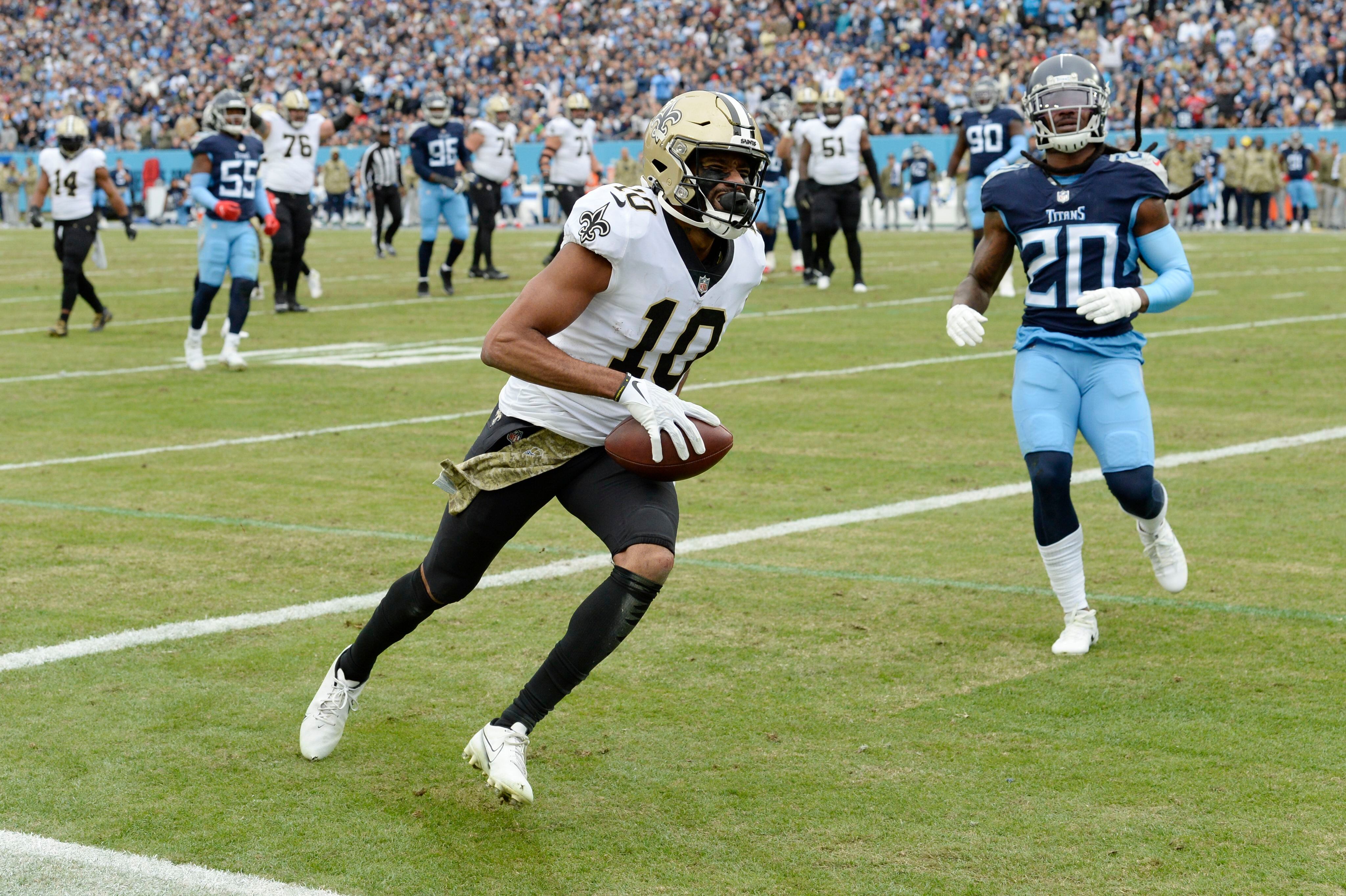 Titans' NFL-best winning streak now 6, edge Saints 23-21